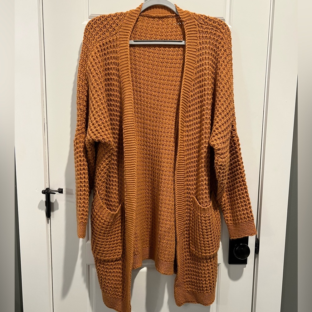 Rust colored knit oversized cardigan